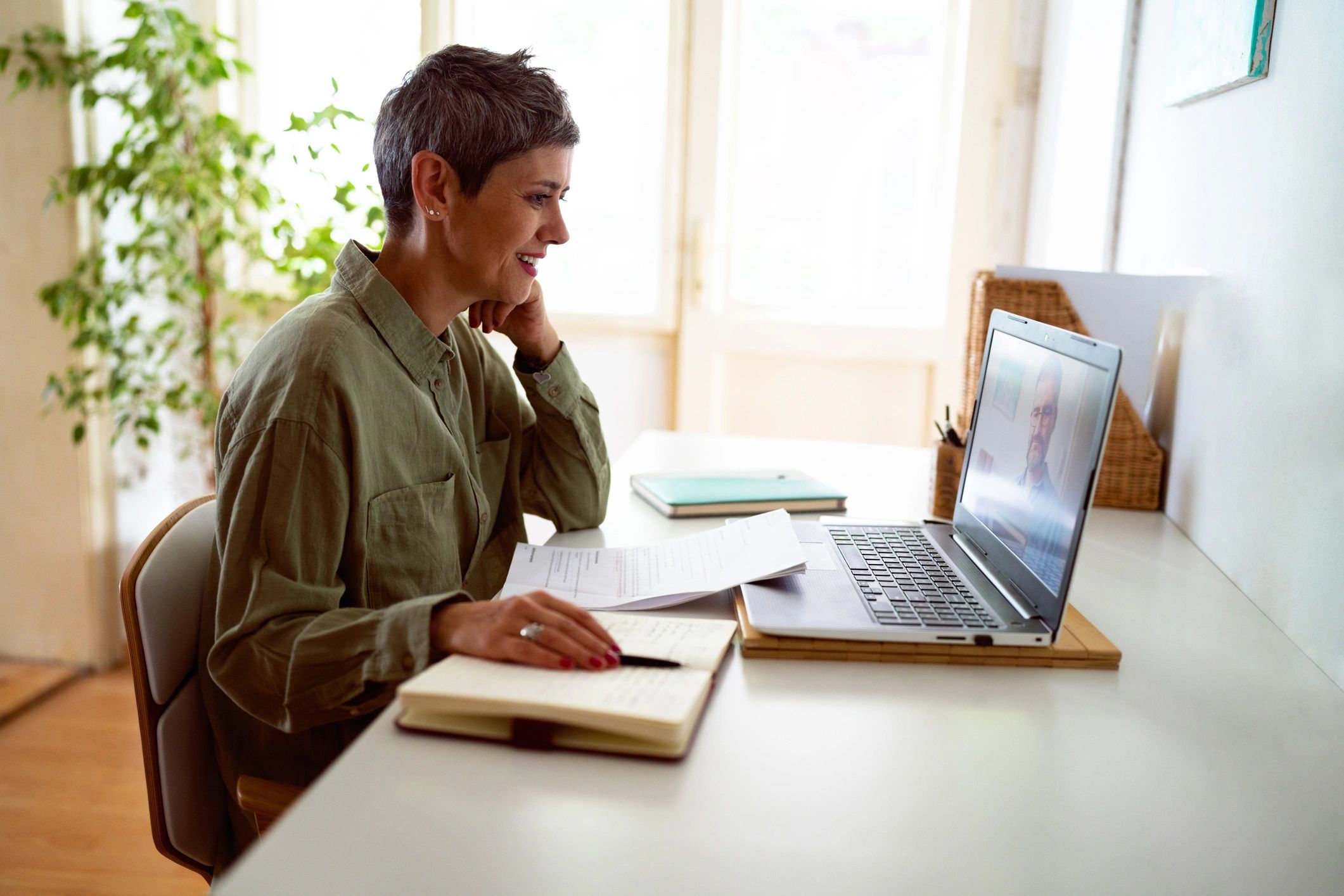 Employee attending an online safety training session on a laptop